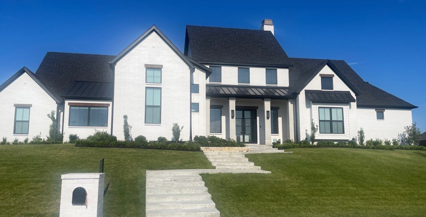 interior-and-exterior-services-in-little-elm-tx Curbside view of a white house in Little Elm TX